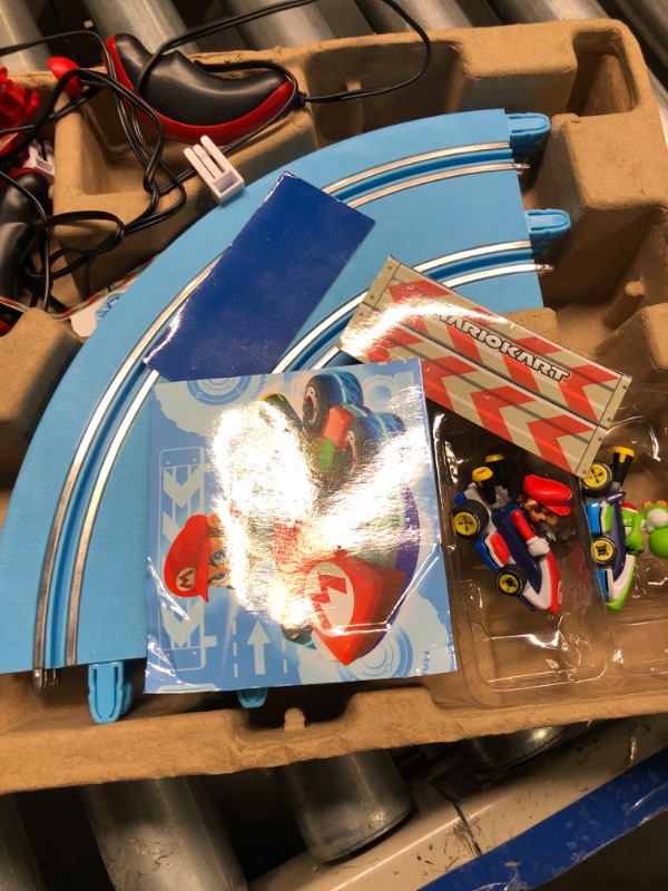 Photo 4 of Carrera First Mario Kart - Slot Car Race Track With Spinners - Includes 2 Cars: Mario and Yoshi - Battery-Powered Beginner Racing Set for Kids Ages 3 Years and Up Mario Kart w/ Spinners