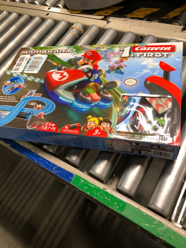 Photo 1 of Carrera First Mario Kart - Slot Car Race Track With Spinners - Includes 2 Cars: Mario and Yoshi - Battery-Powered Beginner Racing Set for Kids Ages 3 Years and Up Mario Kart w/ Spinners