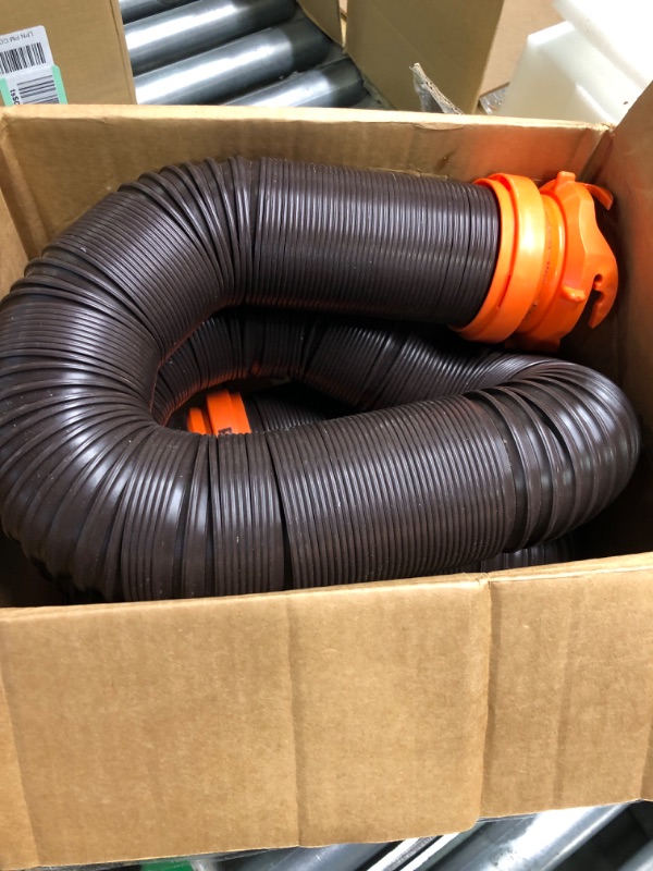 Photo 3 of Camco RhinoFLEX RV Sewer Hose Kit with Swivel Transparent Elbow and 4-in-1 Dump Station Fitting, Brown, 15 Feet (39770) 15ft Sewer Hose Kit Frustration-Free Packaging