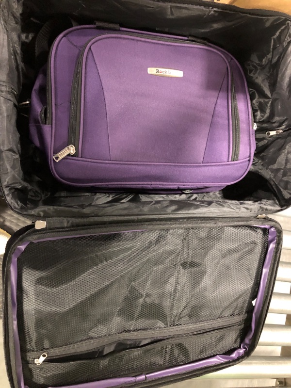 Photo 3 of 20in purple luggage and carry on bag  