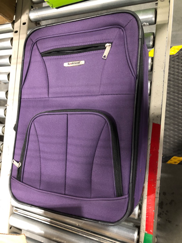 Photo 1 of 20in purple luggage and carry on bag  