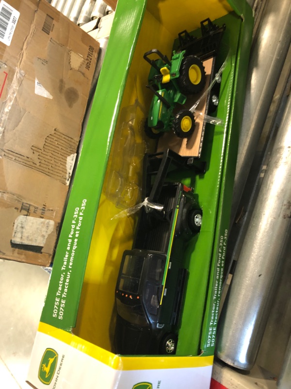 Photo 3 of ERTL 1:32 Scale Ford F350 Pickup and Tractor Set — Includes John Deere Tractor, Ford F350 Pickup and Gooseneck Trailer — 17.25 x 3.2 x 4.5 inches — Ages 3 Years and Up Tractor & Ford