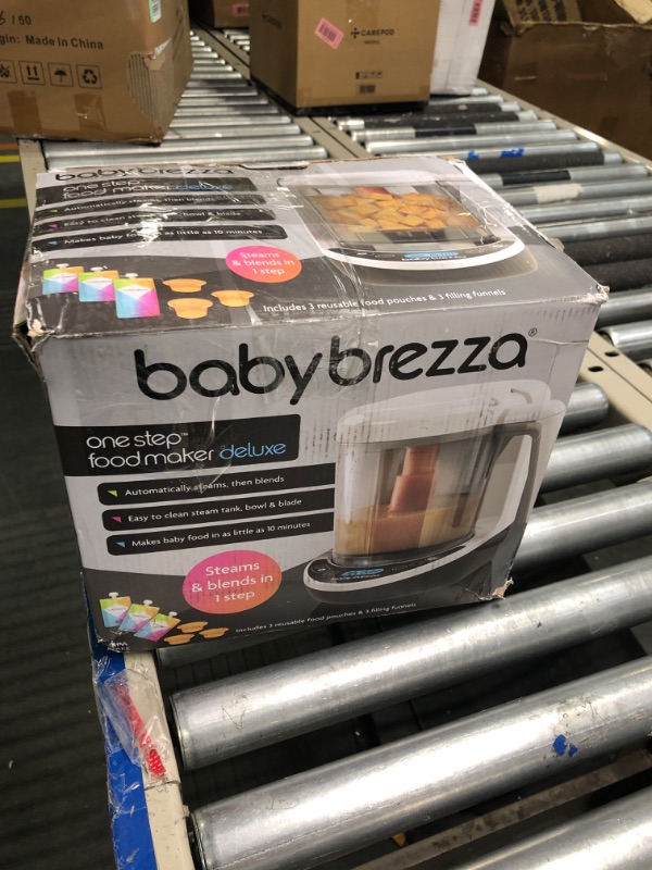 Photo 2 of Baby Brezza One Step Baby Food Maker Deluxe – Cooker and Blender in One to Steam and Puree Baby Food for Pouches - Make Organic Food for Infants and Toddlers - Set Includes 3 Pouches and 3 Funnels