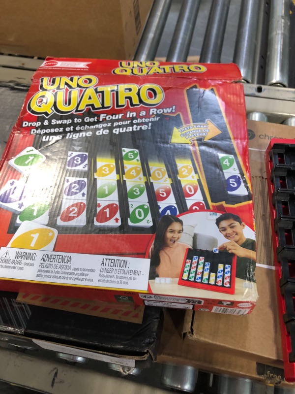 Photo 2 of Mattel Games UNO Quatro Game with Colored Tiles & Plastic Game Grid for Adult, Family & Game Night, 2 to 4 Players Ages 7 Years & Up