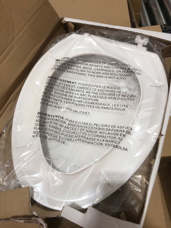 Photo 1 of 2-piece 1.1 GPF/1.6 GPF High Efficiency Dual Flush Complete Elongated Toilet in White, Seat Included
