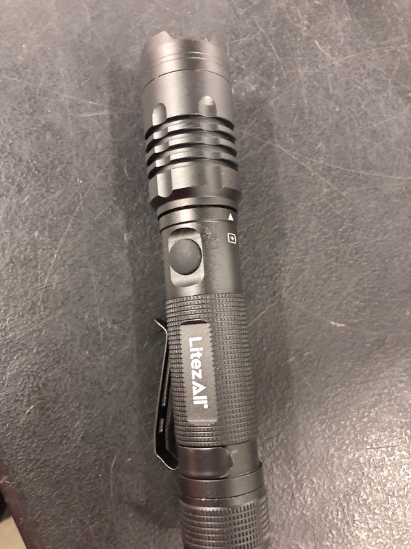 Photo 1 of LitezAll   Lumen Rechargeable Tactical Flashlight - USED - UNKNOWN IF WORKS - UNABLE TO TEST
