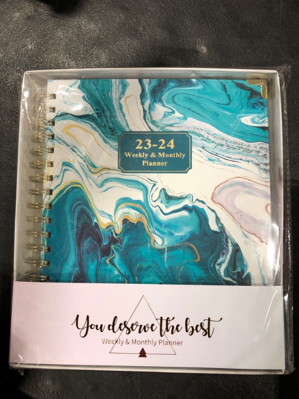 Photo 1 of 2023/2024 Weekly/Monthly Planner.