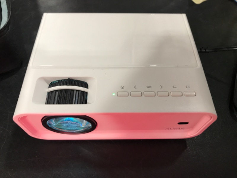 Photo 1 of Mini Projector with 5G WiFi and Bluetooth W/ Tripod & Bag, ALVAR 9000 Lumens Portable Outdoor Movie Projector 240" Display & 1080P Supported, Compatible with TV Stick/HDMI/VGA/USB/iOS & Android… white