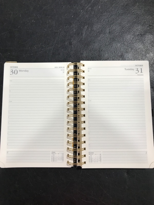 Photo 3 of POPRUN Daily Planner 2023-2024 One Page A Day - [Spiral Hardcover] Academic Calendar (July 23 - June 24) Hourly Appointment Book with Pocket, FSC Paper, 5.5" x 8.5" - Black 5.5'' x 8.5'' Black
