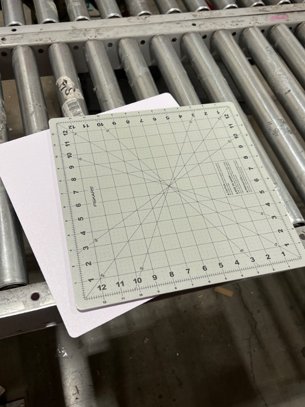 Photo 2 of Fiskars 14x14 inch Self Healing Rotating Cutting Mat