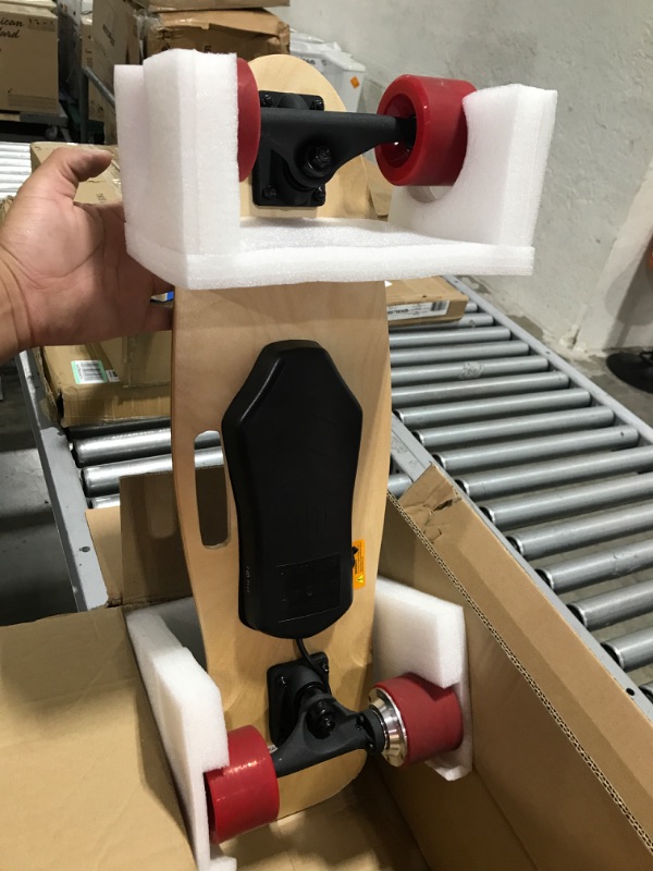 Photo 1 of Caroma Electric Skateboard, 350W Electric Skateboard with Wireless Remote Control for Adult Teens, 12.4MPH Top Speed, 8 Miles Max Range, 3-Speed Adjustment, Load up to 220lbs Red Black