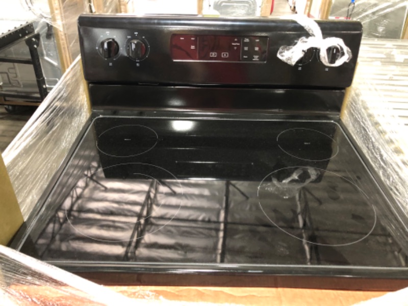 Photo 8 of Whirlpool 30-in Smooth Surface 4 Elements 5.3-cu ft Freestanding Electric Range (Black)