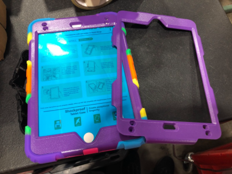 Photo 1 of Shockproof tablet protector with extra plate and shoulder and hand straps