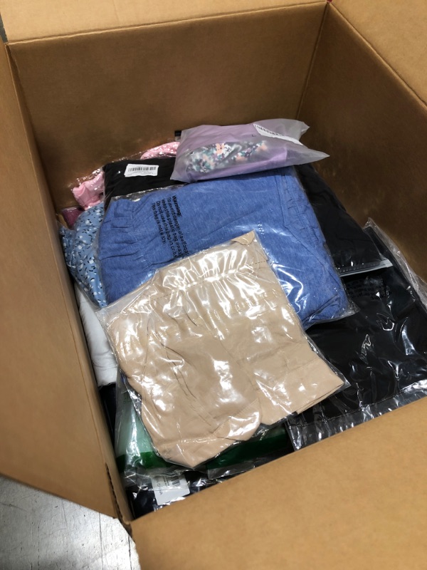 Photo 1 of Clothing box lot. Brand new misc. women's, men's, and kids clothing. Box has 20 pieces.