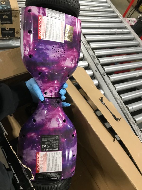 Photo 1 of Hover-1 Helix Electric Hoverboard | 7MPH Top Speed, 4 Mile Range, 6HR Full-Charge, Built-in Bluetooth Speaker, Rider Modes: Beginner to Expert Hoverboard Galaxy