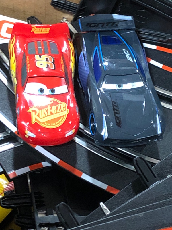 Photo 3 of Carrera GO!!! 62477 Disney Pixar Cars Neon Nights Electric Slot Car Racing Kids Toy Race Track Set Includes 2 Controllers and 2 Cars in 1:43 Scale Disney Cars Neon