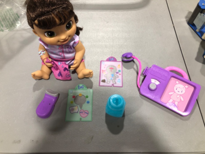 Photo 1 of Baby Alive Lulu Achoo Doll, 12-Inch Interactive Doctor Play Toy with Lights, Sounds, Movements and Tools, Kids 3 and Up, Brown Hair
