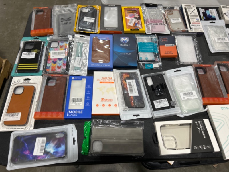 Photo 1 of MISC BOT LOT OF PHONE CASES SOLD AS IS ** 