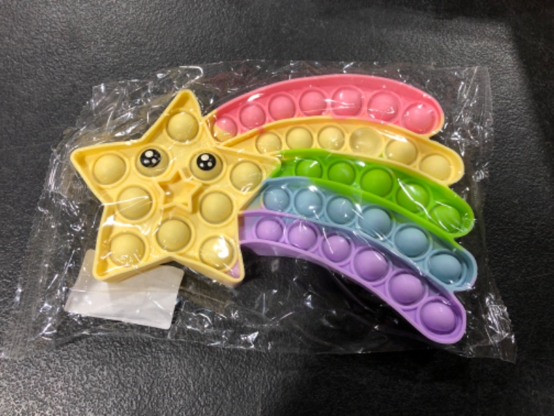 Photo 1 of XITALAXU Pop Bubble Sensory Fidget Toy, Anxiety Restless Reliever Relief Tie Dye Squeeze Toy for Stressed,Silicone Rainbow Stress Reliever Toy,Autism Special Needs Stress Reliever for Kids & Adults Rainbow Star