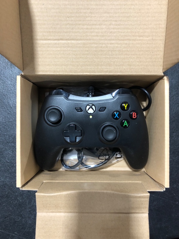 Photo 2 of Amazon Basics Xbox One Wired Controller - 9.8 Foot USB Cable, Black, Version 2