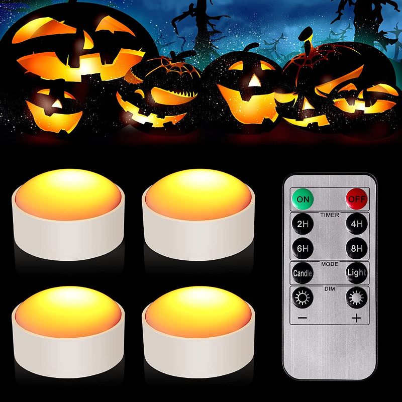 Photo 1 of  4 Pieces Halloween LED Pumpkin Lights Battery Operated Pumpkin Light with Remote Timer Pat Lights for Pumpkins Jack O Lantern LED Light Bright Flickering Flameless Candles for Halloween Decor(White) 
