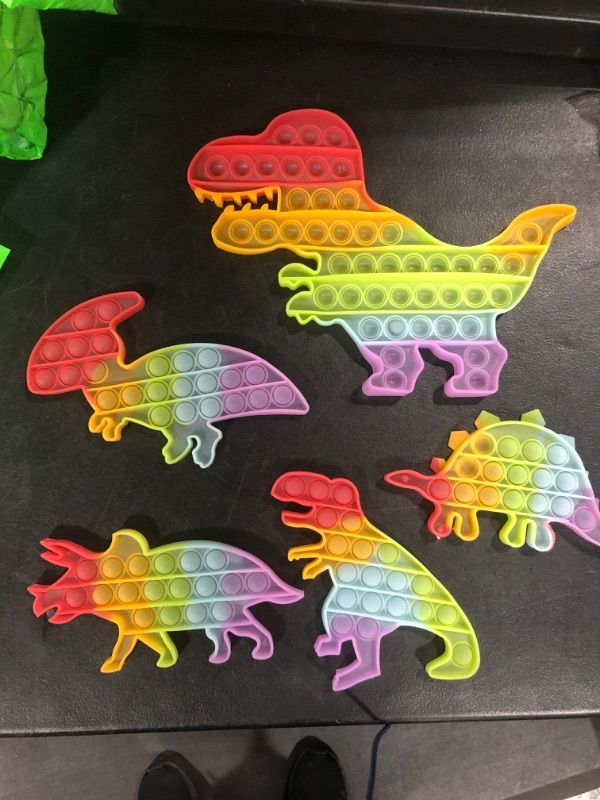 Photo 2 of Dinosaur Toys Party Favors for Kids, Fidget Toy Pop Its Bulk Pack, Stocking Stuffers Sensory Toys Autistic Children Autism ADHD Boys Girls, Treasure Prize Box Fidgets Popit Classroom Small Stress Gift