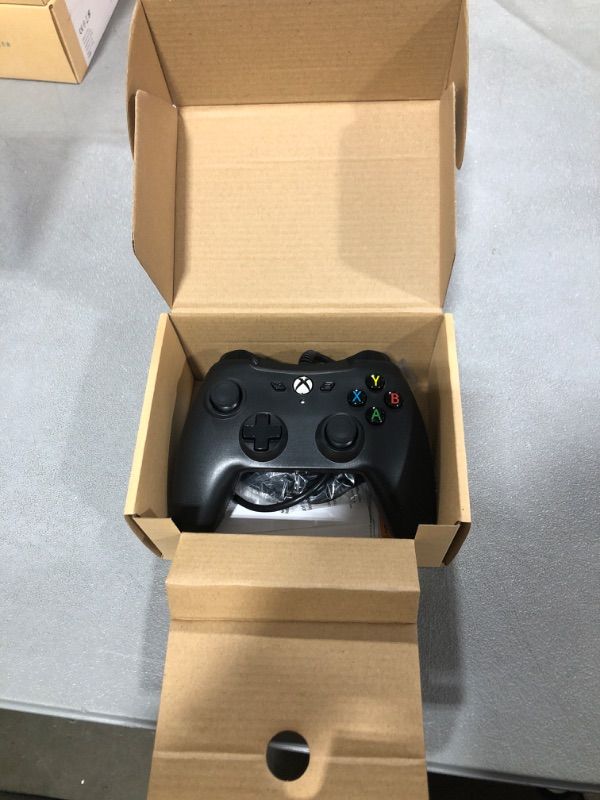 Photo 2 of Amazon Basics Xbox One Wired Controller - 9.8 Foot USB Cable, Black, Version 2