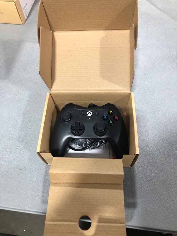 Photo 2 of Amazon Basics Xbox One Wired Controller - 9.8 Foot USB Cable, Black, Version 2