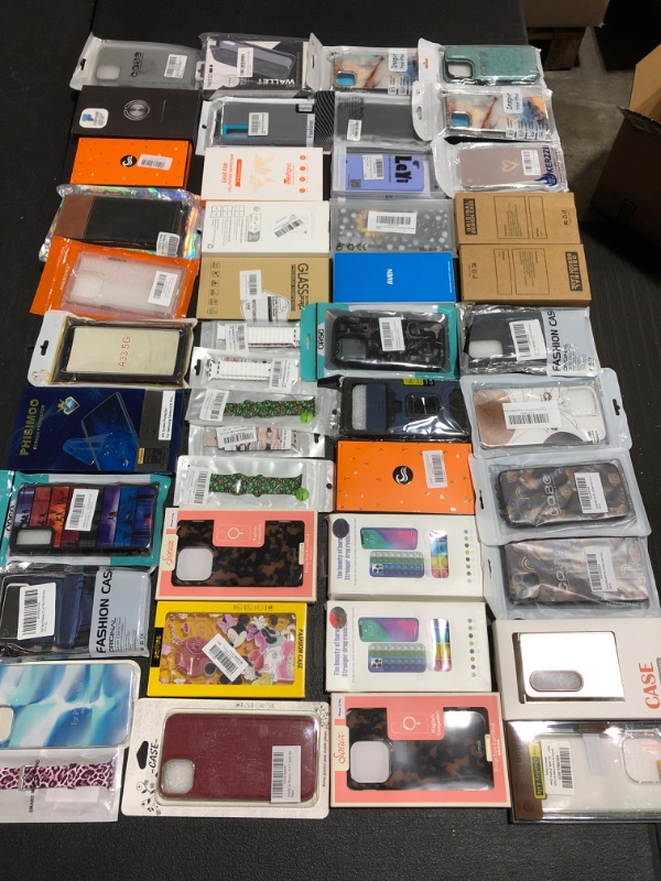 Photo 1 of ASSORTED LOT OF SMARTPHONE CASES & ACCESSORIES. STYLES, COLORS & APPLICATIONS VARY. 