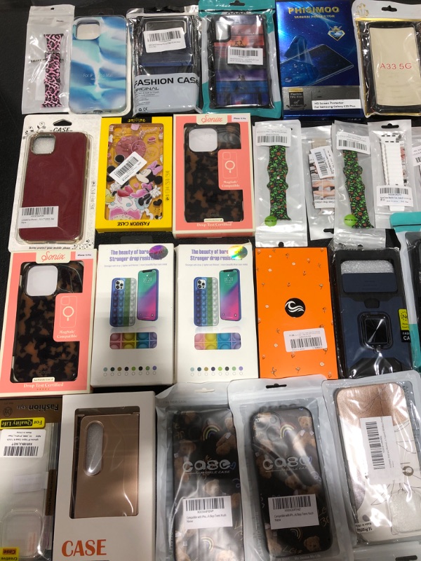 Photo 2 of ASSORTED LOT OF SMARTPHONE CASES & ACCESSORIES. STYLES, COLORS & APPLICATIONS VARY. 