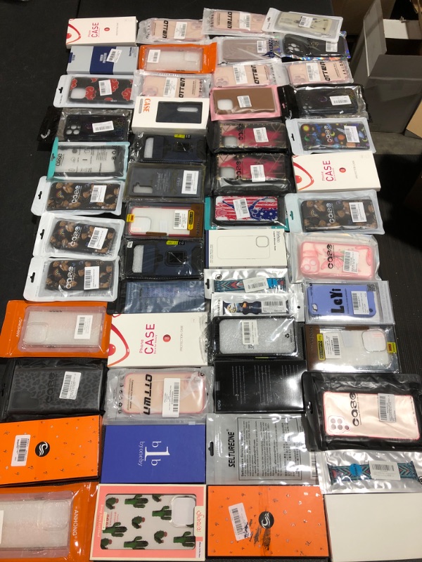 Photo 1 of ASSORTED LOT OF SMARTPHONE CASES & ACCESSORIES. STYLES, COLORS & APPLICATIONS VARY. 