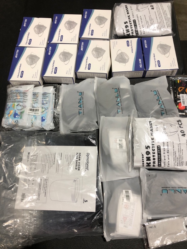Photo 1 of ASSORTED LOT OF FACE MASKS & COVERINGS. STYLES, COLORS & APPLICATIONS VARY. 
