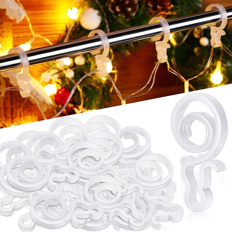 Photo 1 of  Christmas Light Clips Outdoor Gutter Hooks,Christmas Light Hooks for Hanging Outdoor Lights, Gutter Light Clips for All Type Outdoor Roof Lights C5, C6, C7, C9, Mini Icicle, Rope Lights (500 Pieces) 