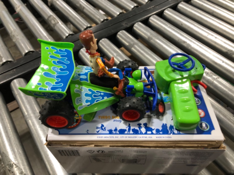 Photo 2 of Disney Pixar Toy Story (1:24) Turbo Buggy Battery-Powered RC Car Woody
