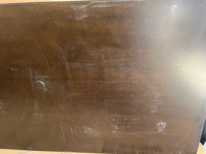 Photo 2 of 6'6ft x 3'4 dark wood table top - scratches and dents 