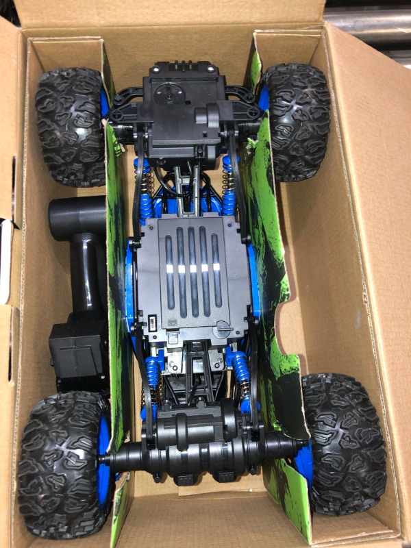 Photo 3 of CROBOLL 1:12 Large Remote Control Car for Boys Kids with Lifting Function,4WD RC Cars Electric Monster Truck Toy Gifts 4X4 Off-Road RC Rock Crawler 2.4GHz All Terrain RC Truck with 2 Batteries(Blue)