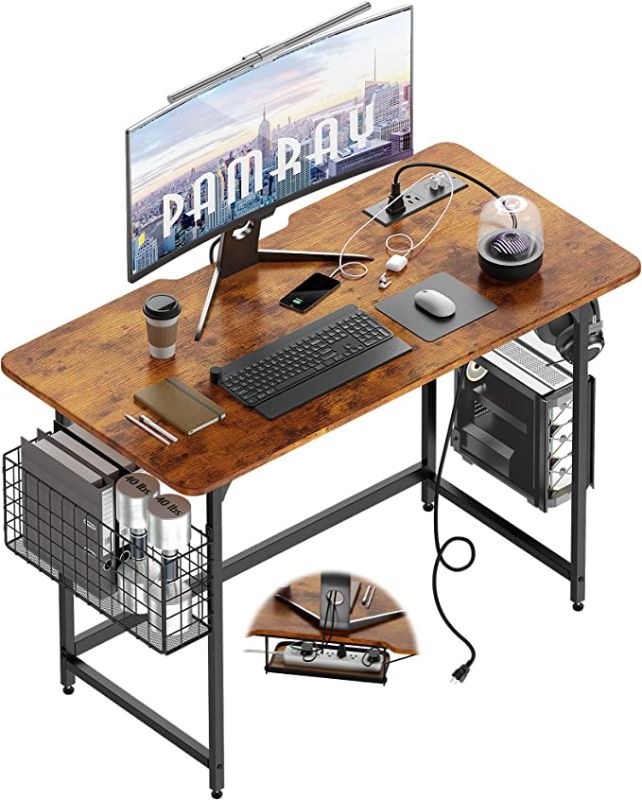 Photo 1 of Pamray 40 inch Computer Desk with Built-in Outlet & USB Charging Port Home Office Desk with Cable Trough and Under Desk Cable Management for Work and Gaming Brown - pieces loose in box