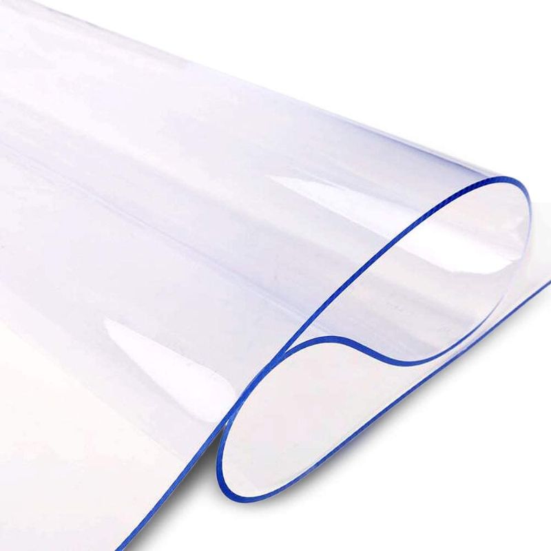 Photo 1 of Clear Plastic Table Cover Protector - Vinyl Protective Pad for Tables and Desks (Clear, 36x72 Inch, 1.5mm Thick) Clear 36 x 72 in, 1.5 mm thick