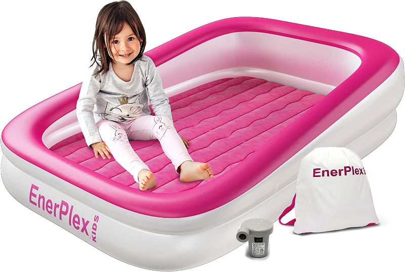 Photo 1 of EnerPlex Kids Inflatable Travel Bed with High Speed Pump, Portable Air Mattress for Kids on The Go, Blow up Toddler Travel Bed with Sides – Built-in Safety Bumper - Pink
