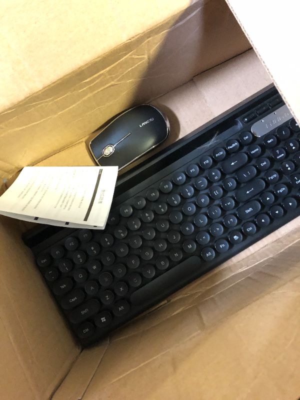 Photo 1 of LANGTU KEYBOARD AND MOUSE