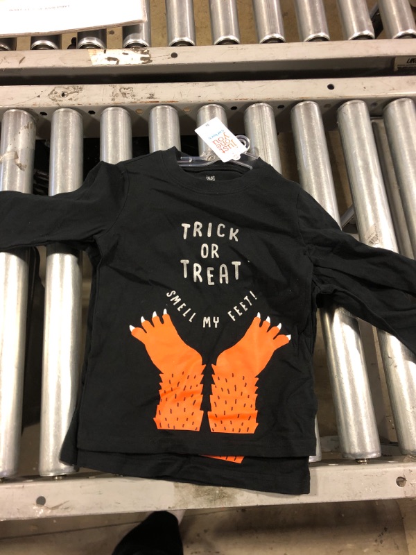 Photo 1 of KIDS BLACK TRICK OR TREAT LONG SLEEVE, "SMELL MY FEET" PRINT SIZE 3T 