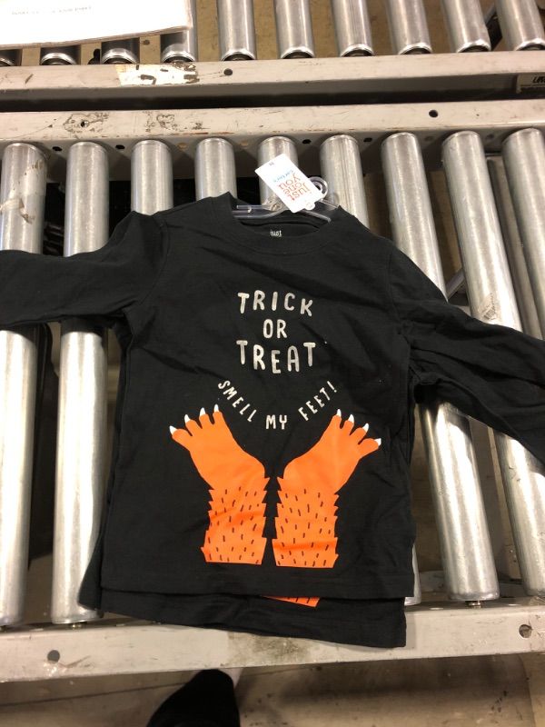 Photo 1 of KIDS BLACK TRICK OR TREAT LONG SLEEVE, "SMELL MY FEET" PRINT SIZE 2T