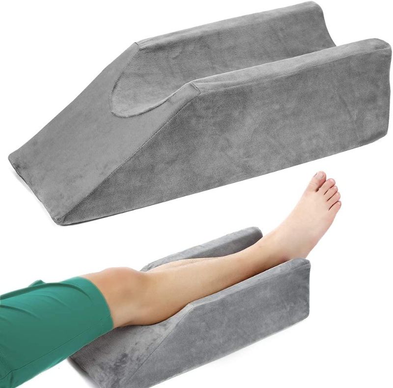Photo 1 of Leg Elevation Wedge Pillow - with Full Memory Foam Top, High-Density Leg Rest Elevating Foam Wedge - Relieves and Recovers Foot and Ankle Injury, Leg Pain, Hip, Knee Pain, Improves Blood Circulation