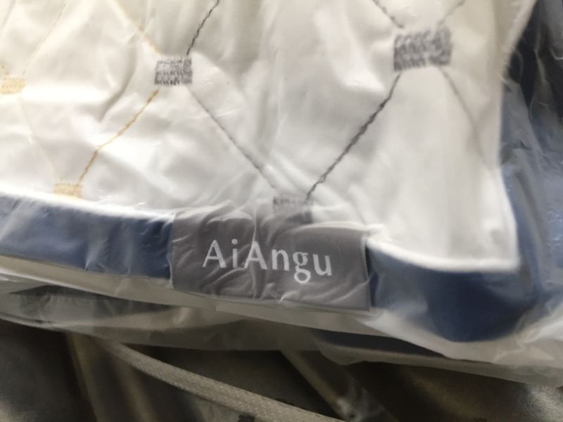 Photo 1 of AiAngu Shredded Memory Foam Bed Pillow for Sleeping Cooling Pillows for Back, Stomach and Side Sleeper with Adjustable Loft Pillow - Hypoallergenic Machine-Washable-King
