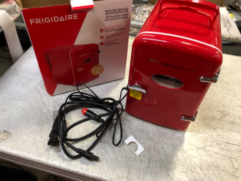 Photo 2 of Frigidaire EFMIS129-RED Mini Portable Compact Personal Fridge Cooler, 6 Cans
