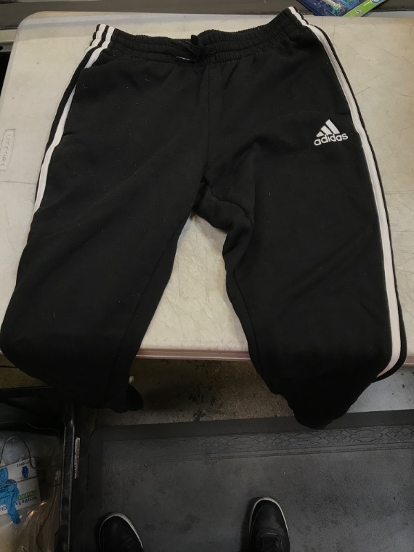 Photo 1 of ADIDAS SWEATPANTS 
SIZE MEDIUM 