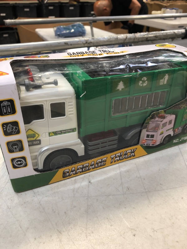 Photo 2 of Toy Garbage Truck for Kids with 4D Lights and Sounds - Battery Operated Automatic Bump & Go Car - Sanitation Truck Stickers