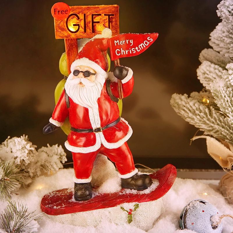 Photo 1 of 13'' Christmas Santa Claus Snowboarding Figurines Decorations with Solar Light, Mrsvirop Resin Indoor Outdoor Christmas Figurines Table Statues Collectibles for Xmas Home Bathroom Table Top Décor