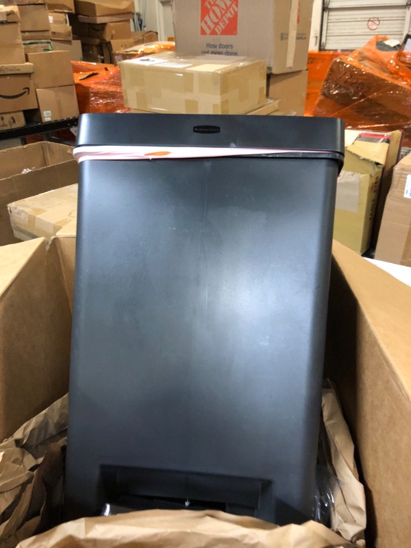 Photo 1 of trash can 