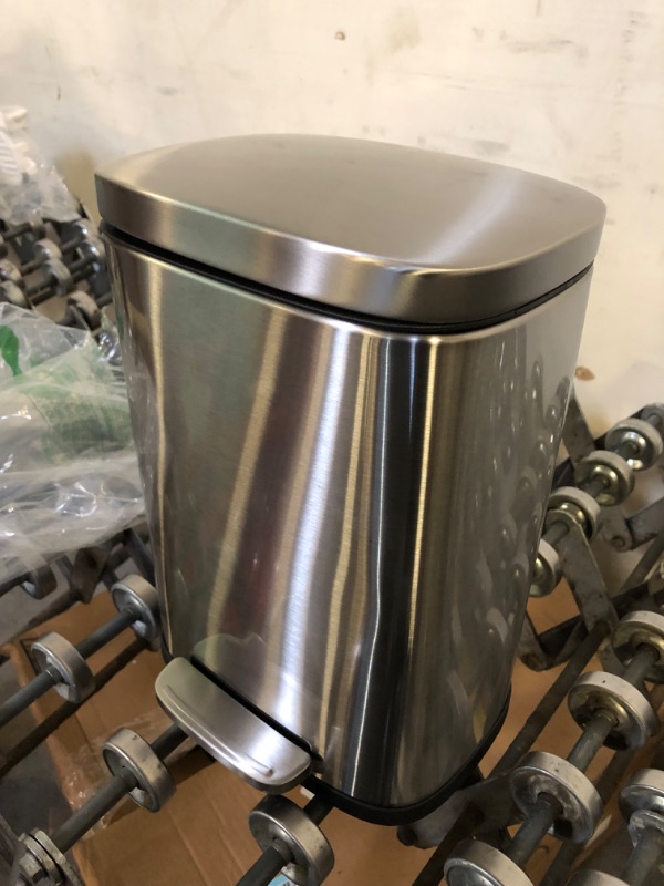 Photo 1 of Amazon Basics 5 Liter / 1.3 Gallon Soft-Close, Smudge Resistant Trash Can with Foot Pedal - Brushed Stainless Steel, Satin Nickel Finish 5L / 1.3 Gallon --------- OUT OF THE BOX NEW, SOME DENTS ON ITEM AS SHOWN IN PICTURES